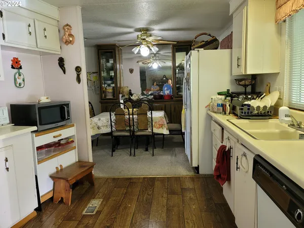 a view of a livingroom with furniture and furniture