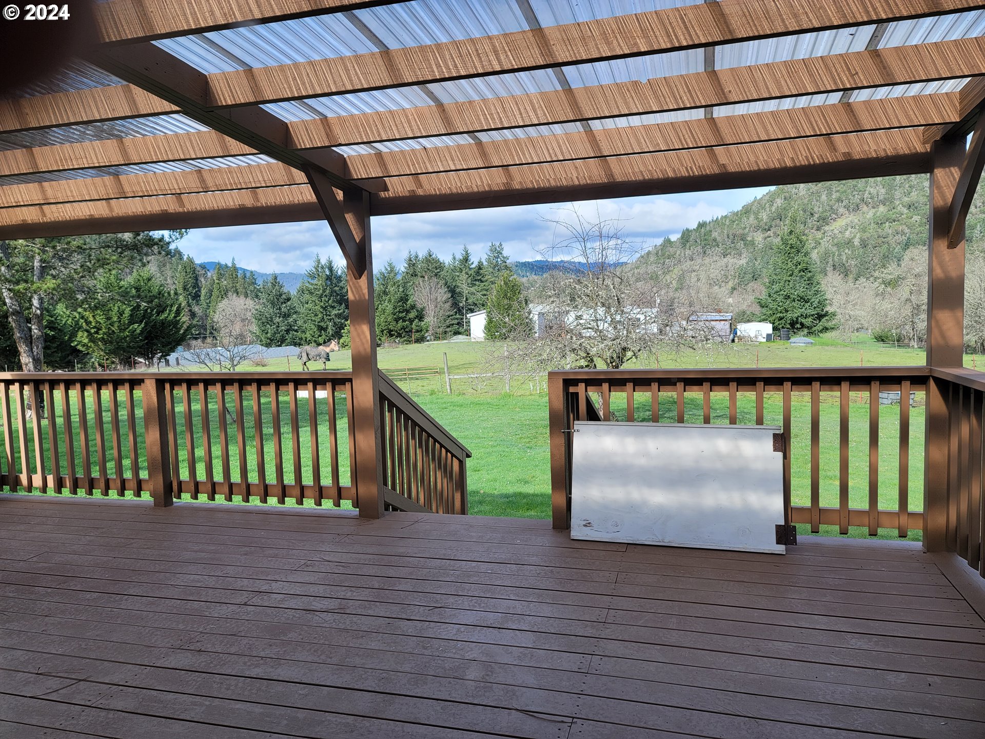 449 Evergreen Ridge Road Riddle, OR 97469 - Photo 10 of 21 a view of outdoor space with swimming pool