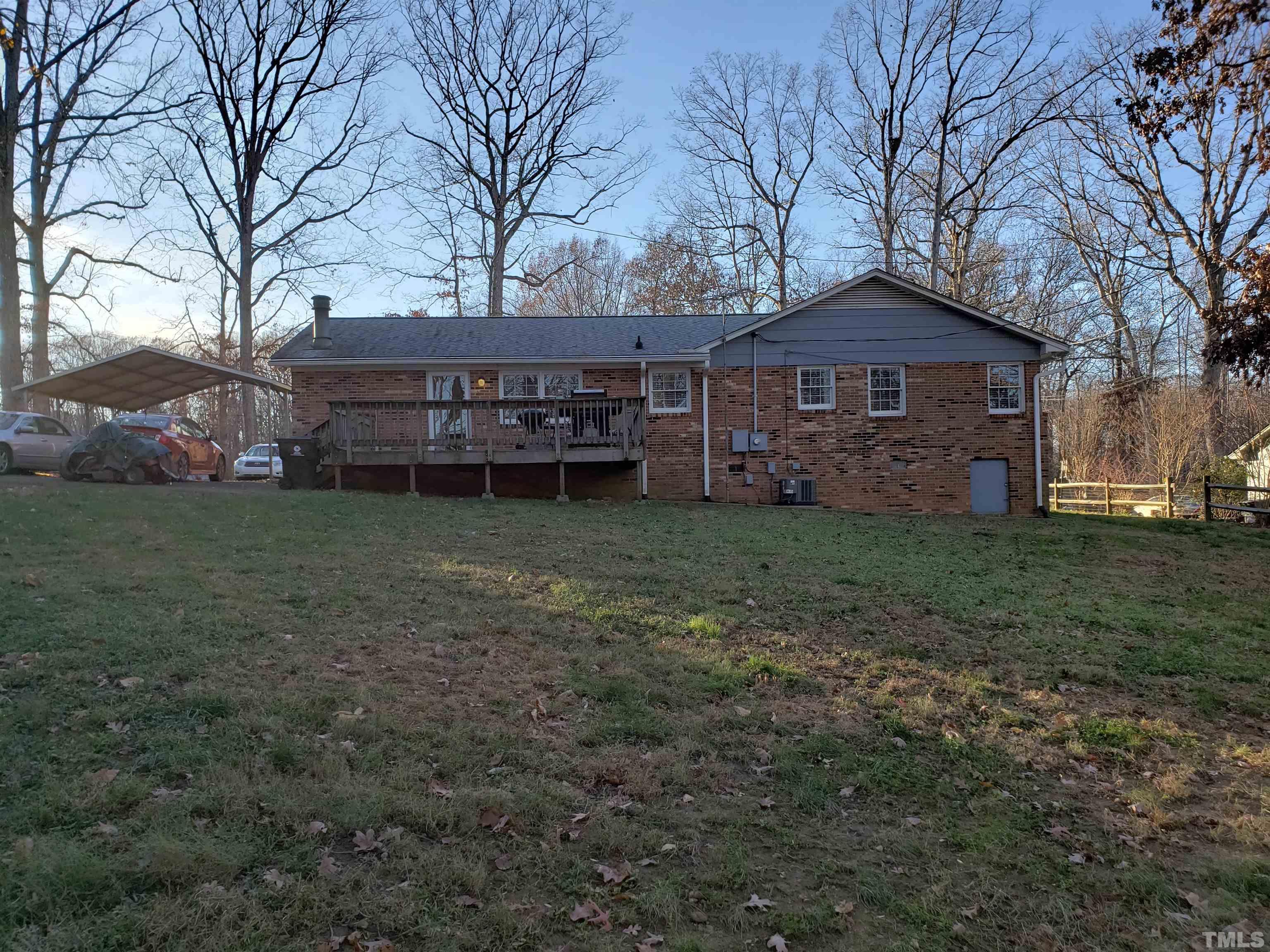 5610 Earl Road Durham, NC 27712 - Photo 2 of 38 a view of a house with a yard