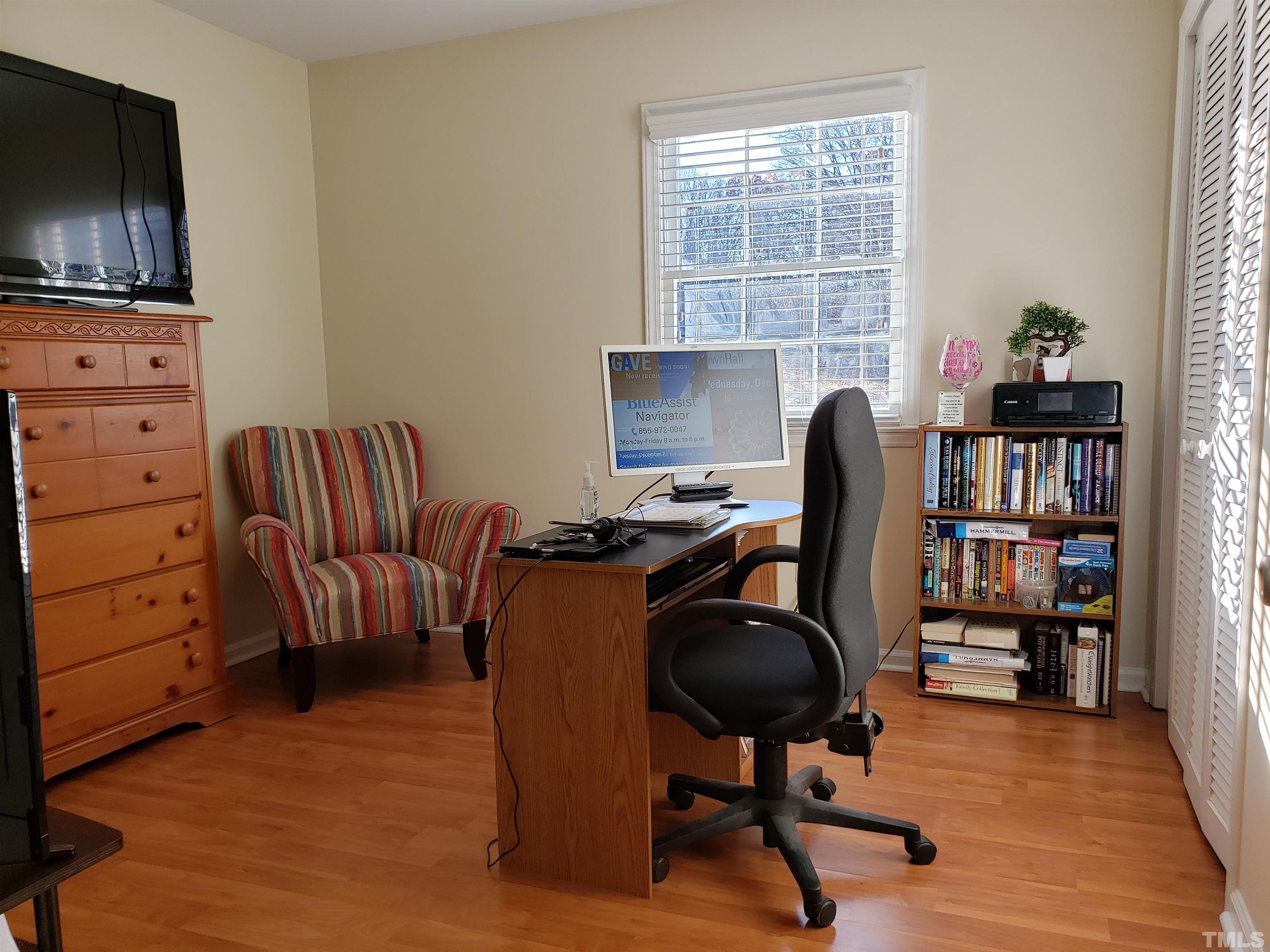 5610 Earl Road Durham, NC 27712 - Photo 23 of 38 a view of a workspace with furniture and a window