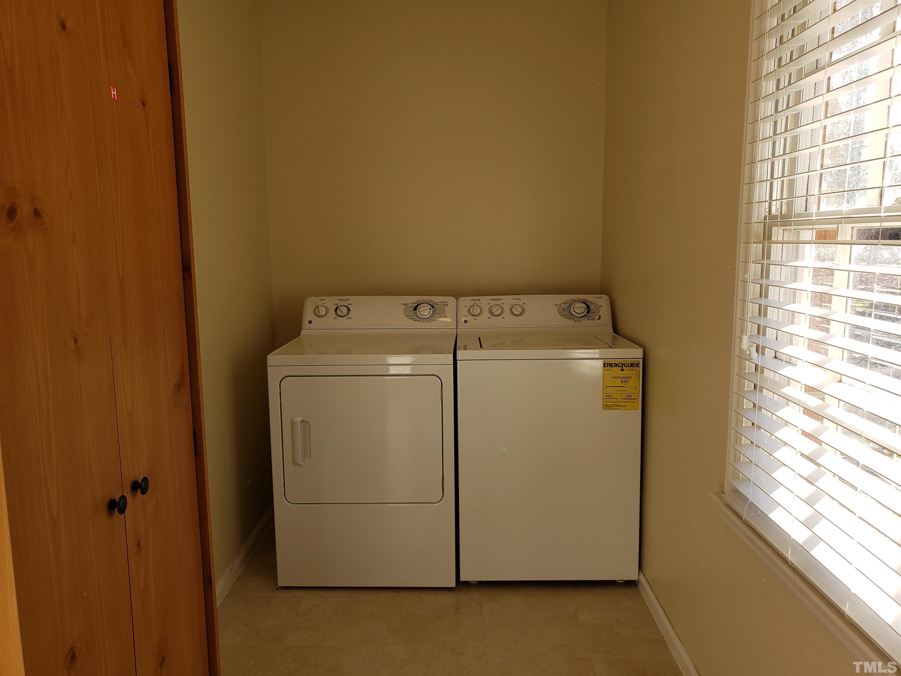5610 Earl Road Durham, NC 27712 - Photo 38 of 38 a utility room with dryer and washer