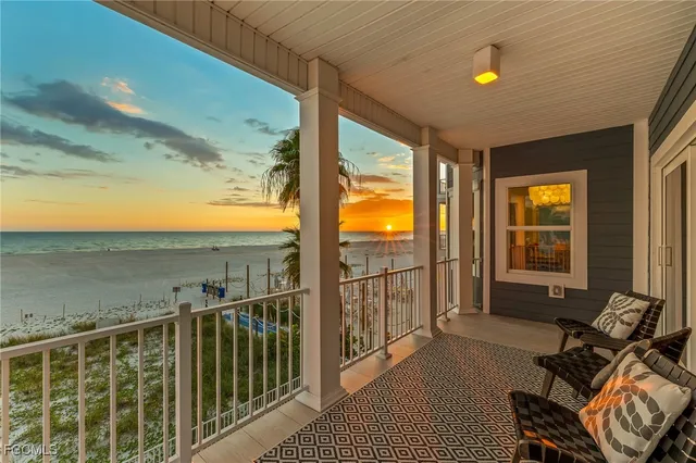 a view of a swimming pool with a lounge chair