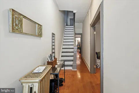 a view of entryway with wooden floor