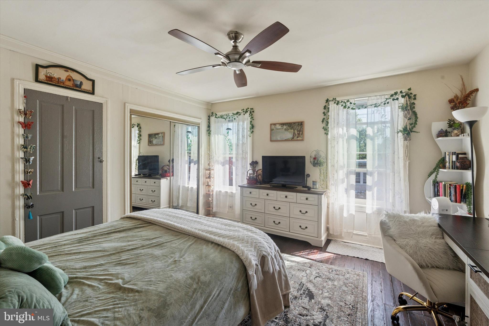 3817 Hamilton Street Philadelphia, PA 19104 - Photo 15 of 20 a bedroom with a bed and a flat screen tv