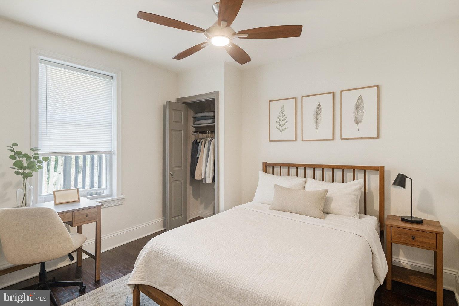 3817 Hamilton Street Philadelphia, PA 19104 - Photo 17 of 20 a bedroom with a bed a table and chair