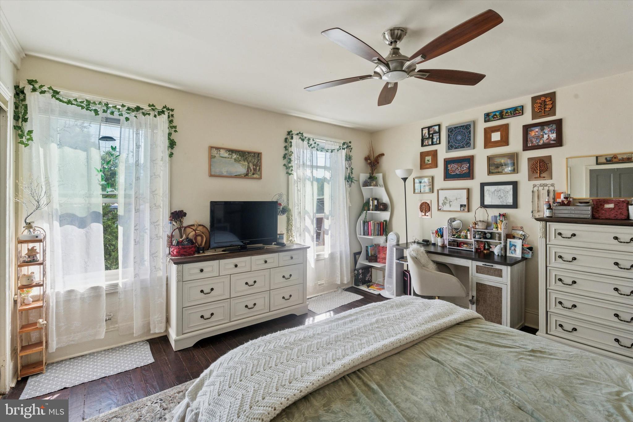 3817 Hamilton Street Philadelphia, PA 19104 - Photo 19 of 20 a bed room with a bed and a television