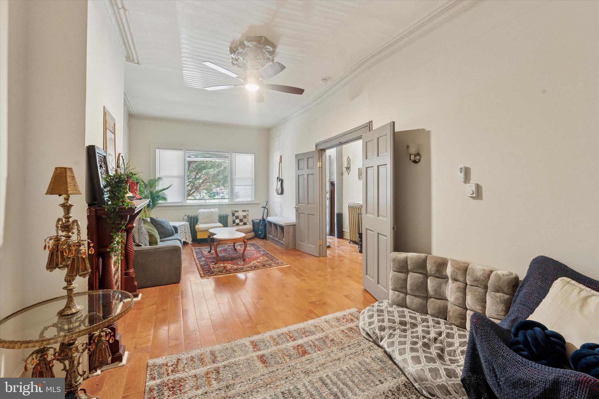 3817 Hamilton Street Philadelphia, PA 19104 - Photo 2 of 20 a living room with furniture and a large mirror