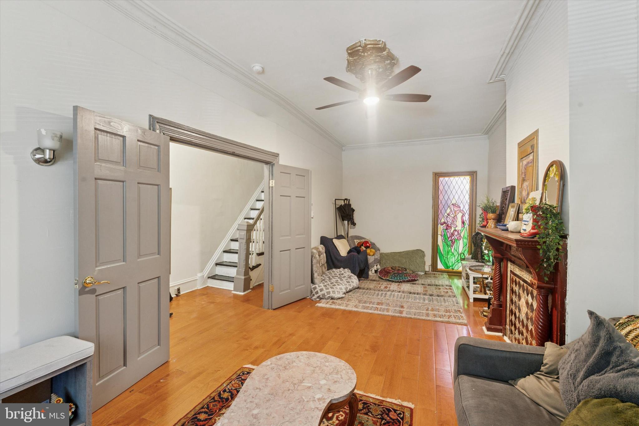 3817 Hamilton Street Philadelphia, PA 19104 - Photo 3 of 20 a living room with furniture and a wooden floor