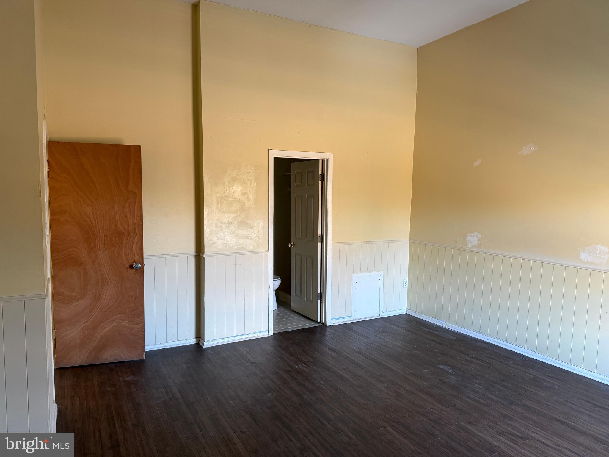 9342 Canterbury Riding, Unit 11 Laurel, MD 20723 - Photo 16 of 25 an empty room with wooden floor and closet