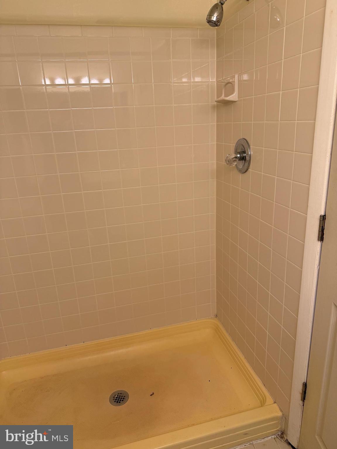 9342 Canterbury Riding, Unit 11 Laurel, MD 20723 - Photo 18 of 25 a bathroom with a bathtub