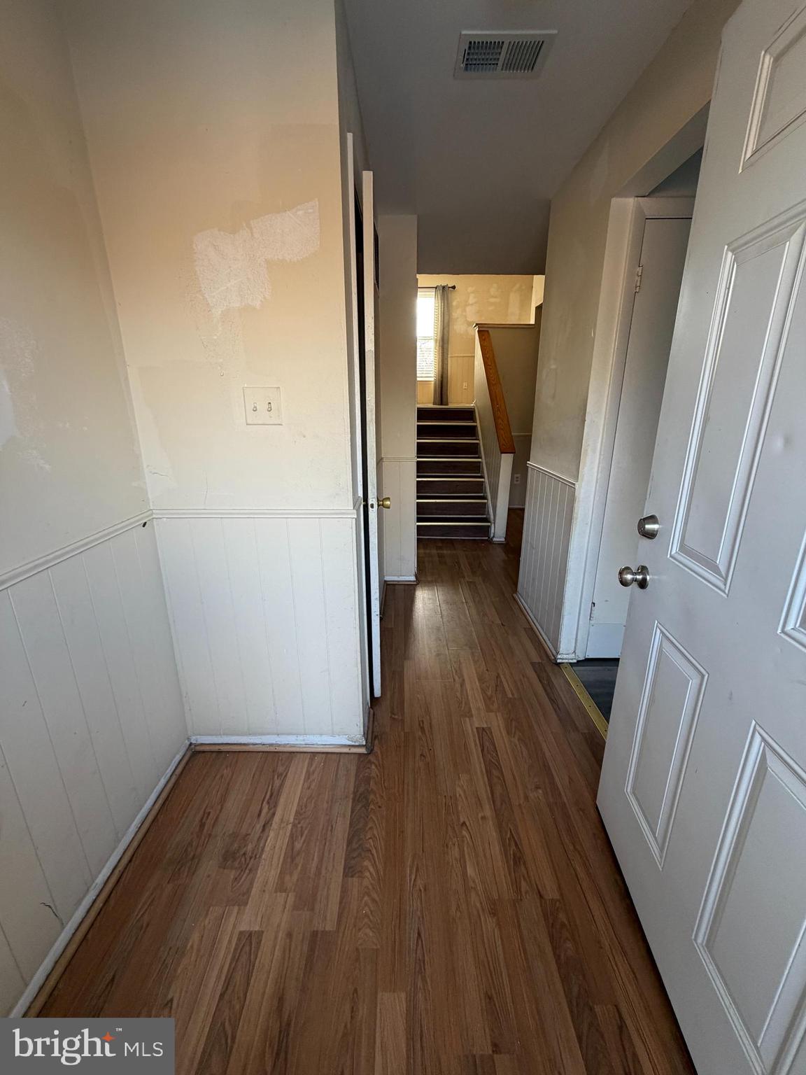 9342 Canterbury Riding, Unit 11 Laurel, MD 20723 - Photo 2 of 25 a view of wooden floor in an empty room