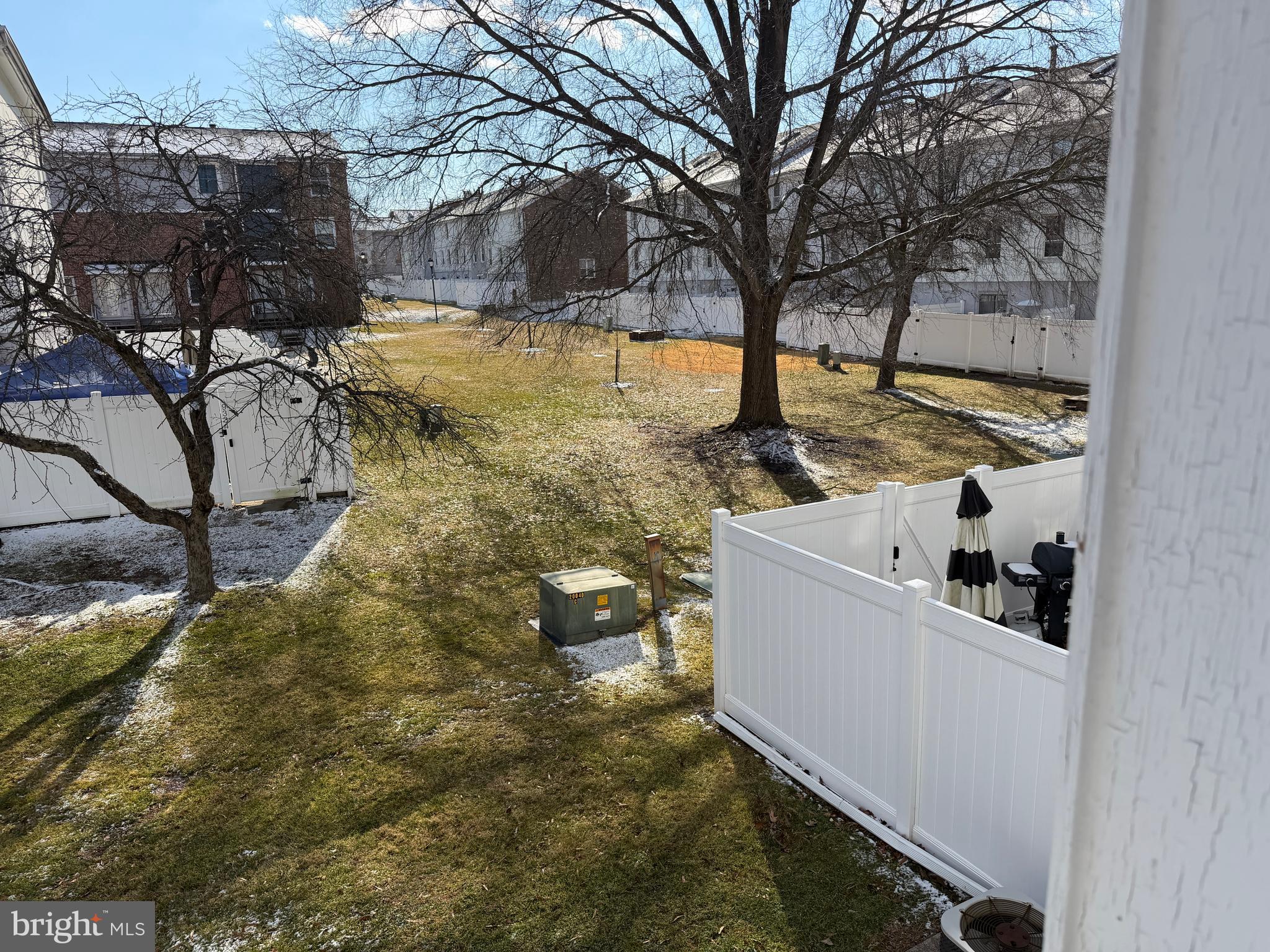 9342 Canterbury Riding, Unit 11 Laurel, MD 20723 - Photo 22 of 25 a view of a yard with wooden fence