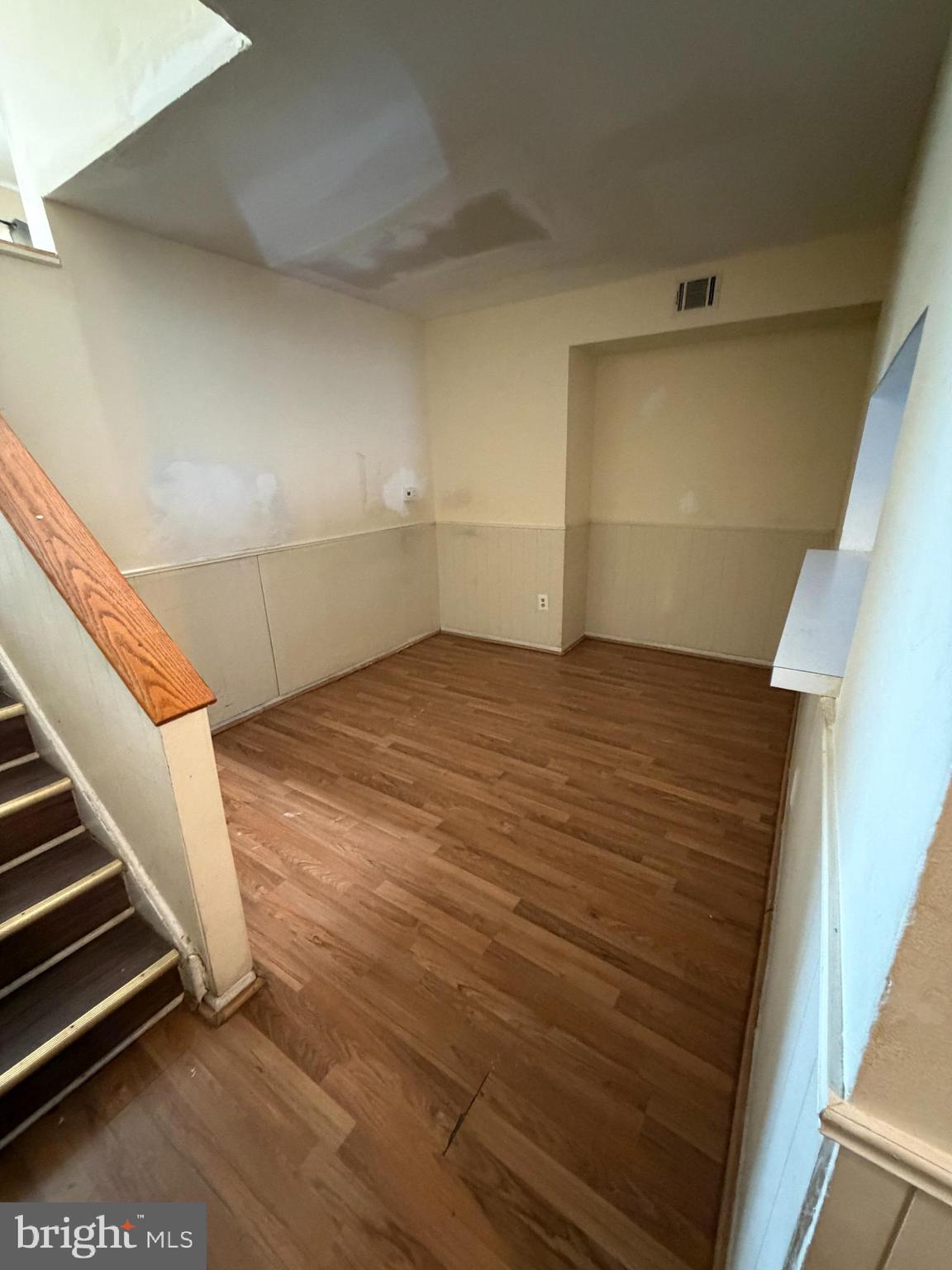 9342 Canterbury Riding, Unit 11 Laurel, MD 20723 - Photo 5 of 25 a view of an empty room with stairs