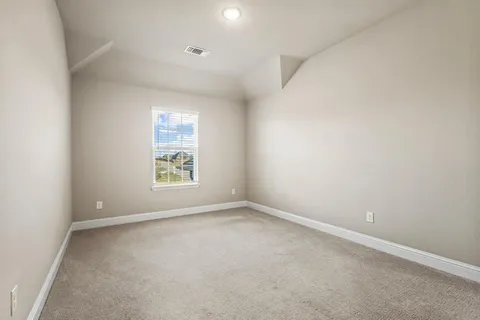 an empty room with an entryway