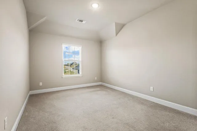 an empty room with an entryway