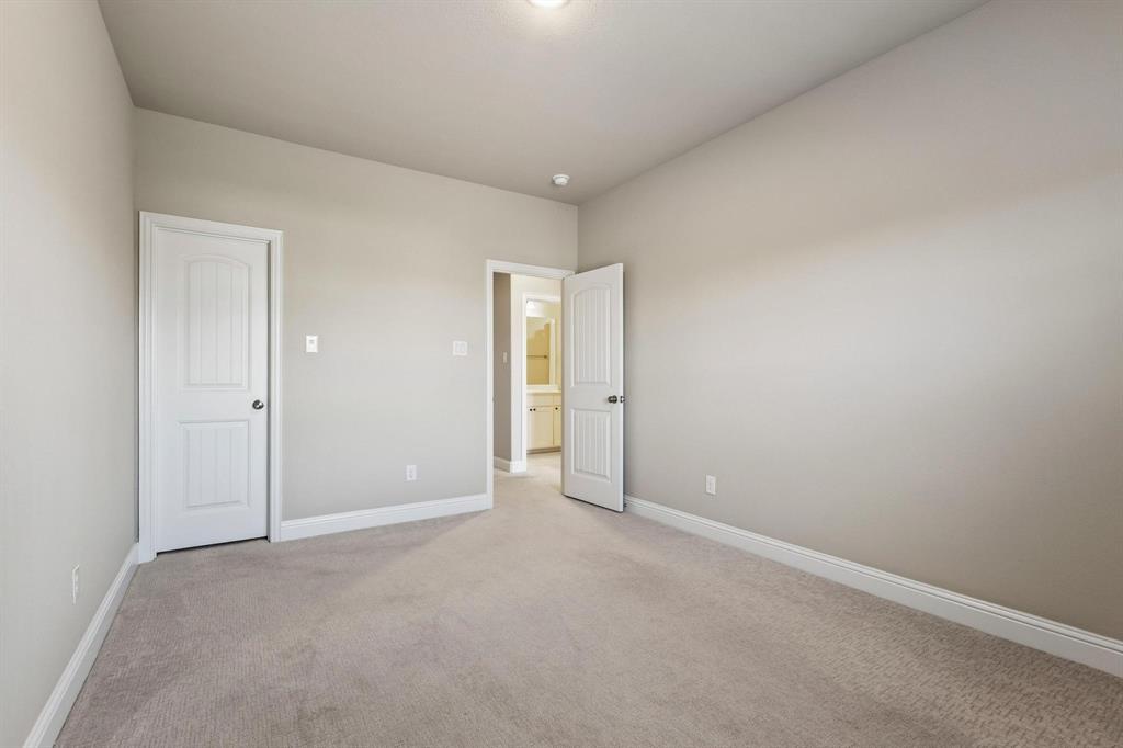 4001 Gentle Creek Lane Nevada, TX 75173 - Photo 30 of 40 an empty room with an entryway