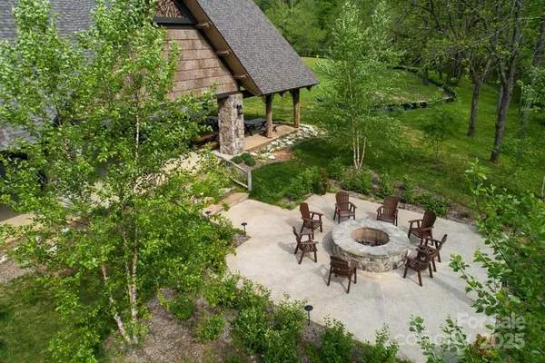 a view of an outdoor sitting area with fire pit