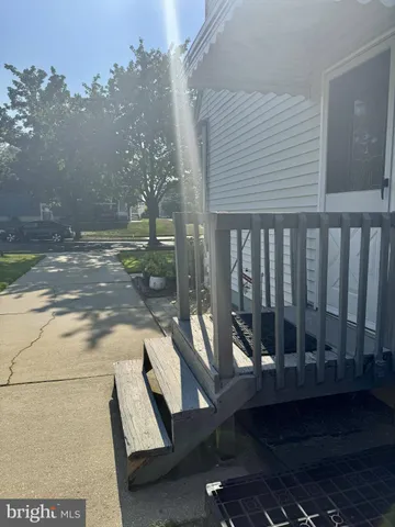 a view of a porch with furniture