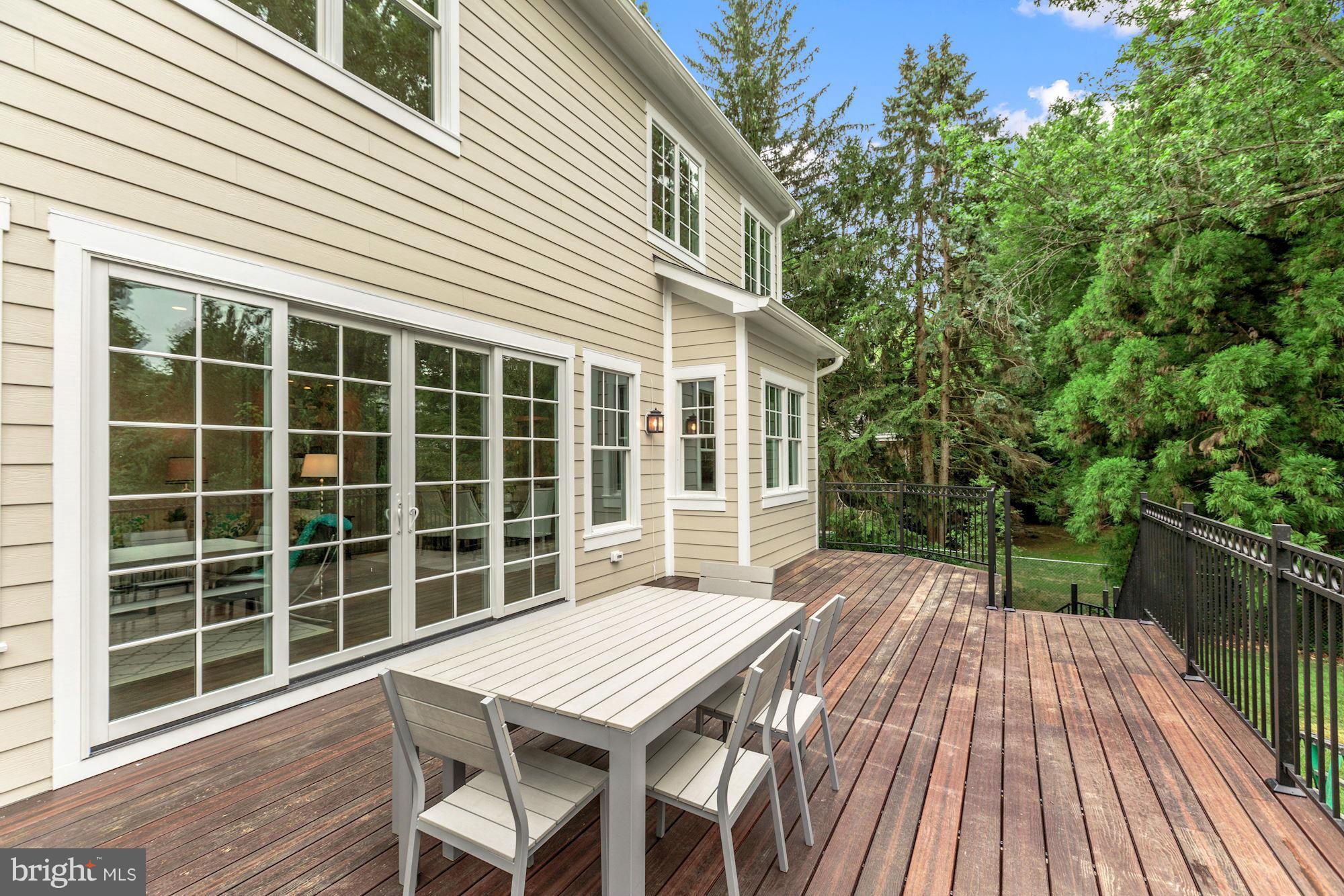 1600 Brookside Road McLean, VA 22101 - Photo 10 of 29 Composite rear deck w/glass doors to Fam Rm
