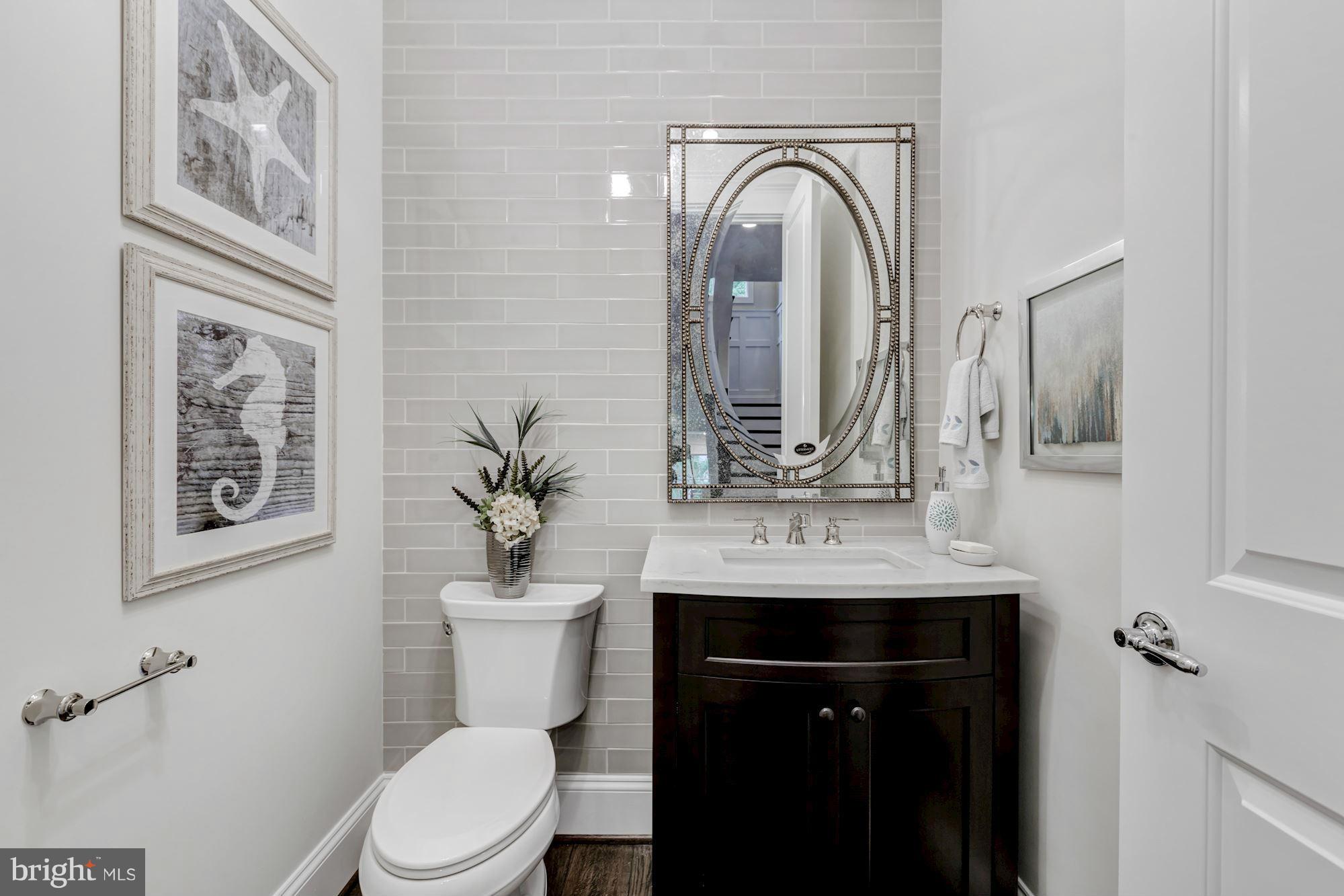 1600 Brookside Road McLean, VA 22101 - Photo 13 of 29 Powder Rm w/accent tile wall and marble countertop