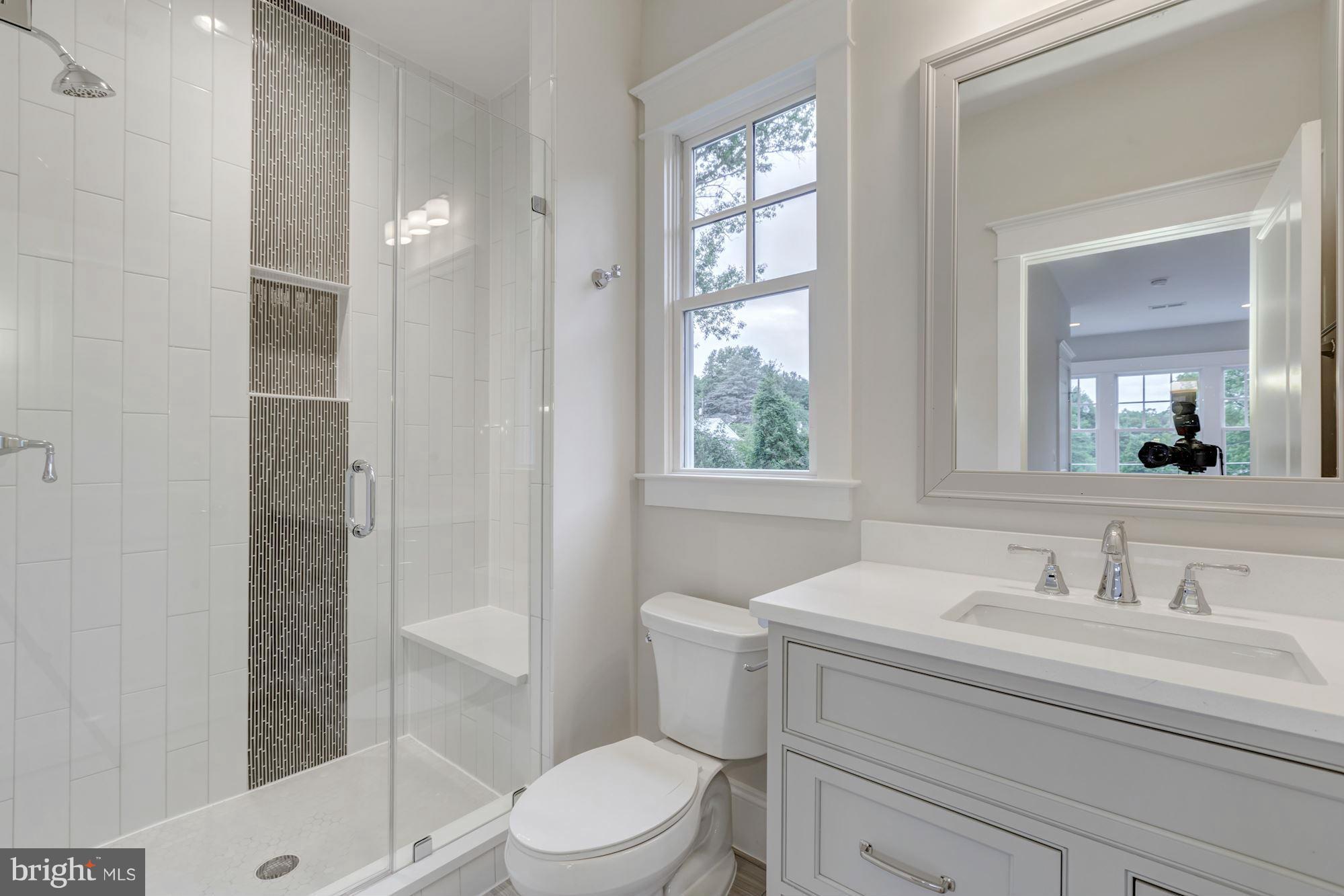 1600 Brookside Road McLean, VA 22101 - Photo 21 of 29 Secondary BA all w/custom cabinetry, designer tile