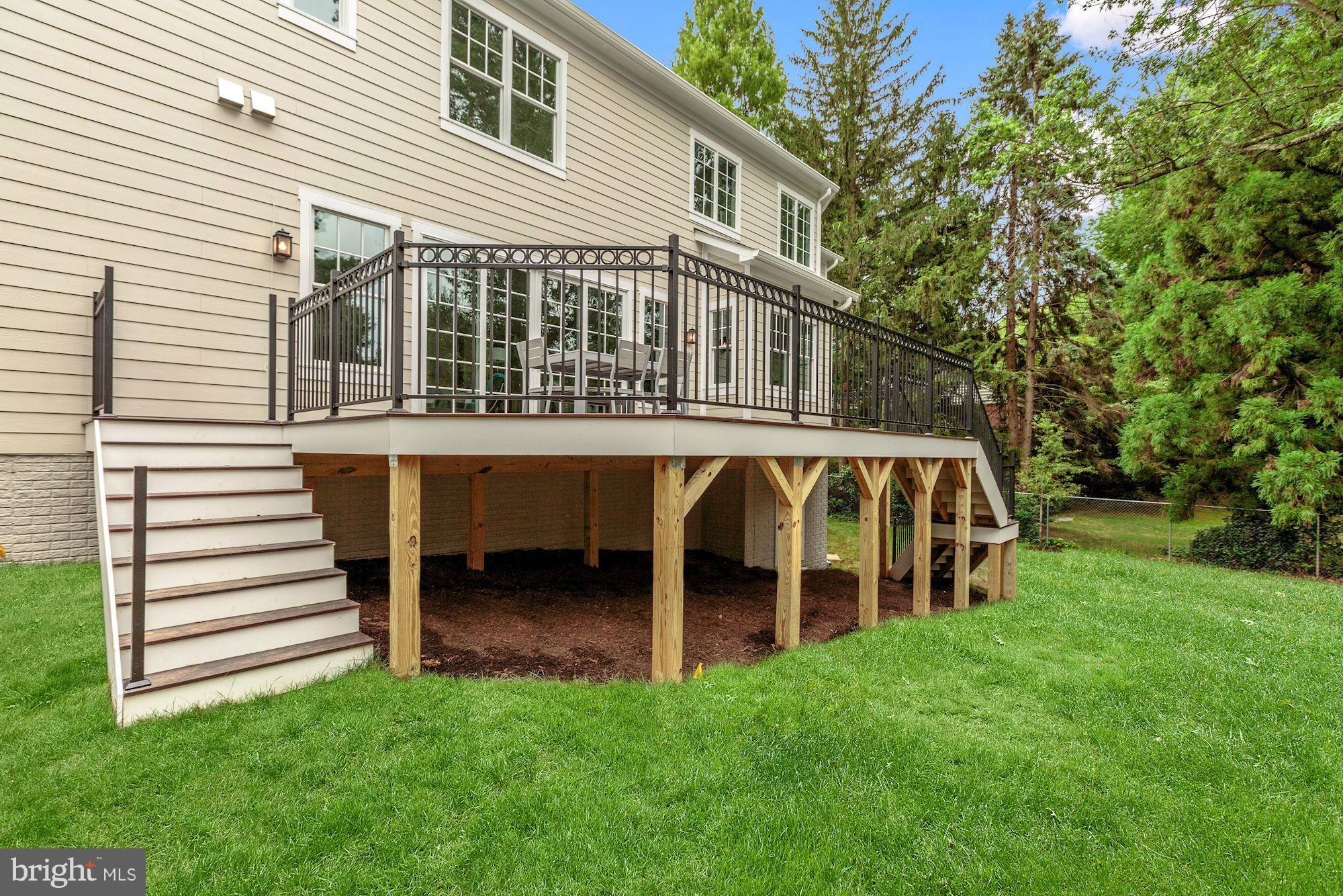 1600 Brookside Road McLean, VA 22101 - Photo 28 of 29 Rear composite deck off Fam Room w/stairs to lawn