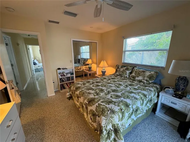 a view of a hallway view with staircase