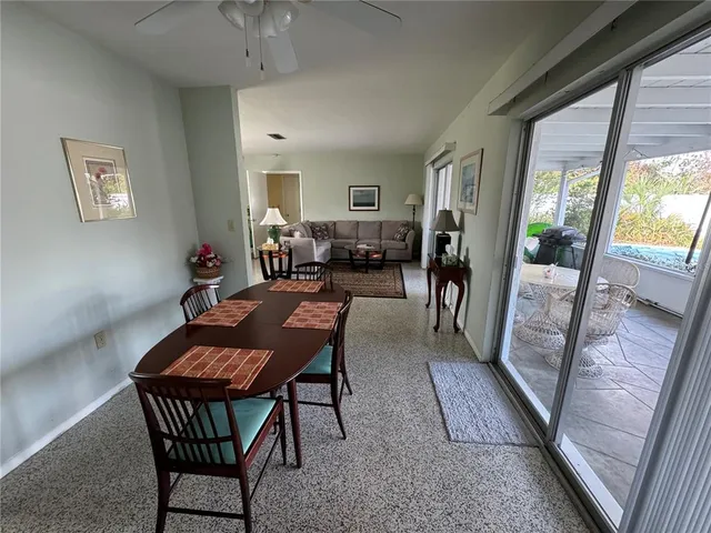 a kitchen with stainless steel appliances granite countertop a sink a stove a microwave a counter top and cabinets