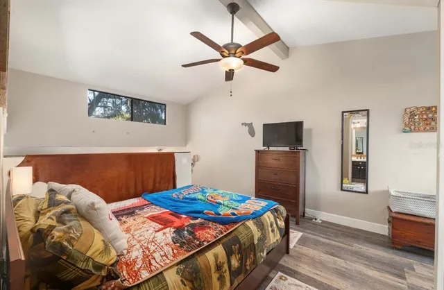 a picture of a bench in front of a wall