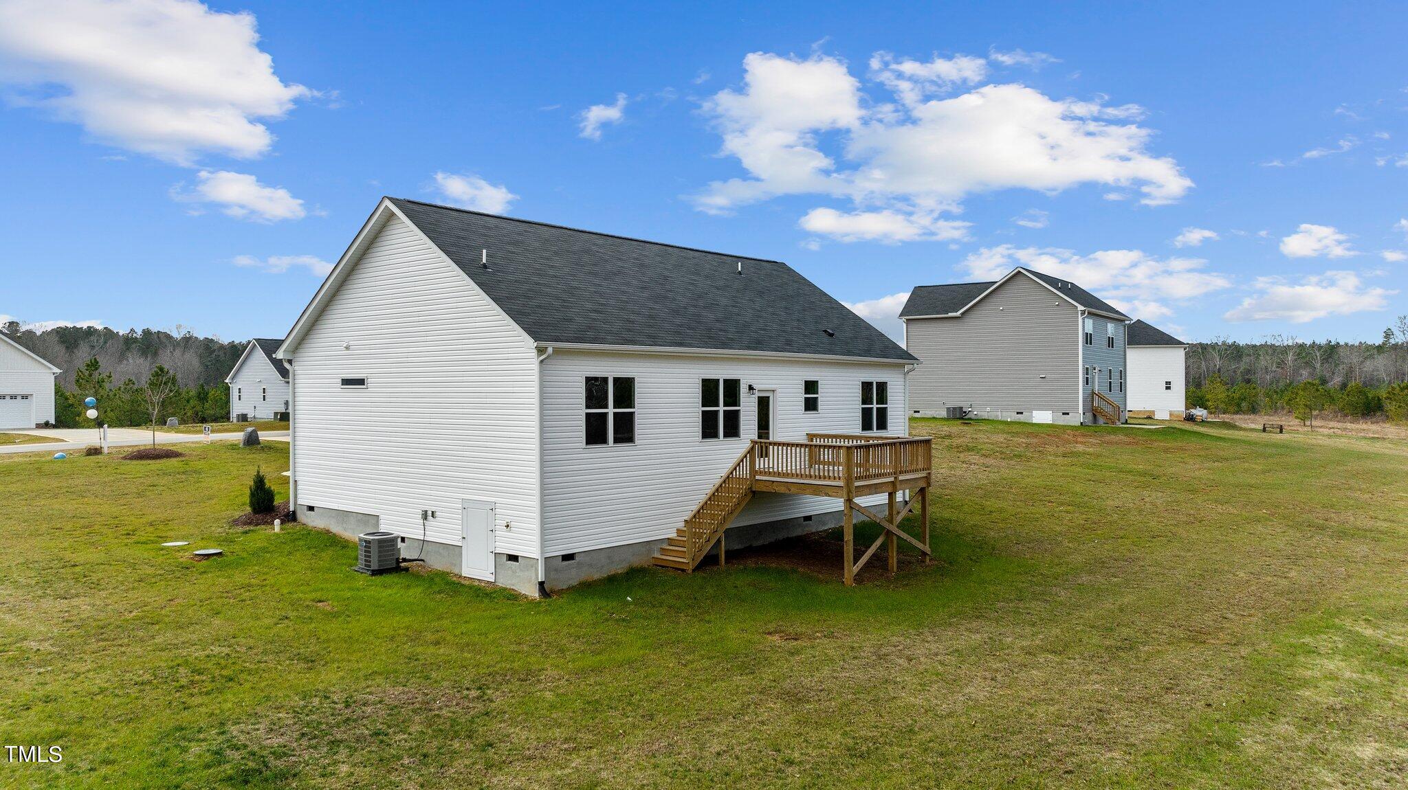30 Brookhaven Drive Spring Hope, NC 27882 - Photo 17 of 20 a view of a house with a yard