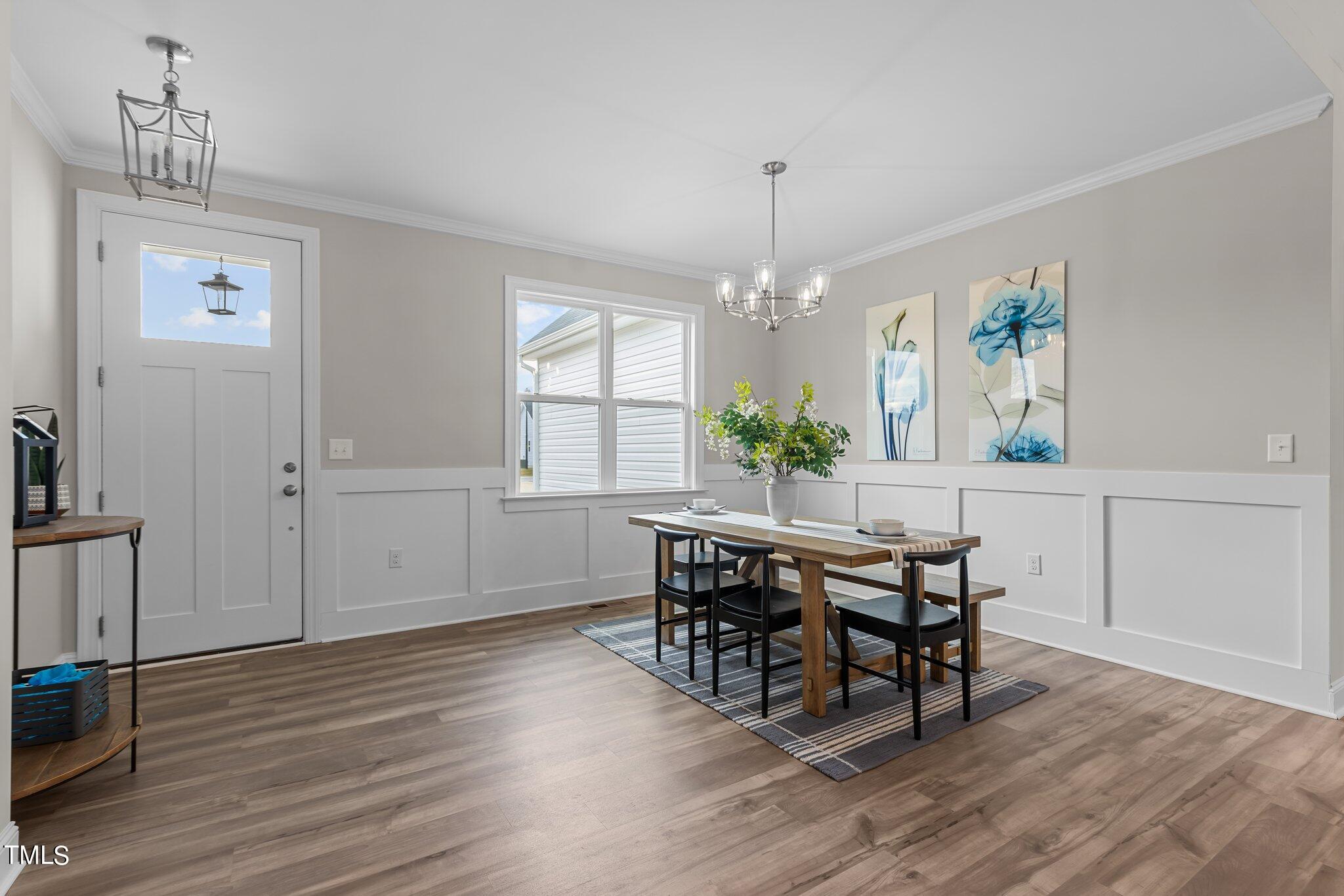 30 Brookhaven Drive Spring Hope, NC 27882 - Photo 2 of 20 a view of a dining room with furniture and wooden floor
