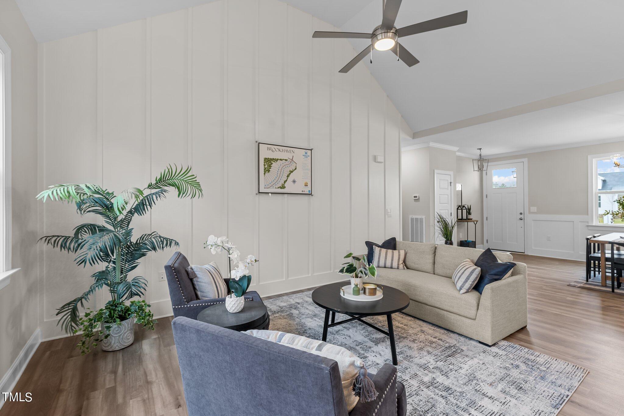 30 Brookhaven Drive Spring Hope, NC 27882 - Photo 7 of 20 a living room with furniture potted plant and a window