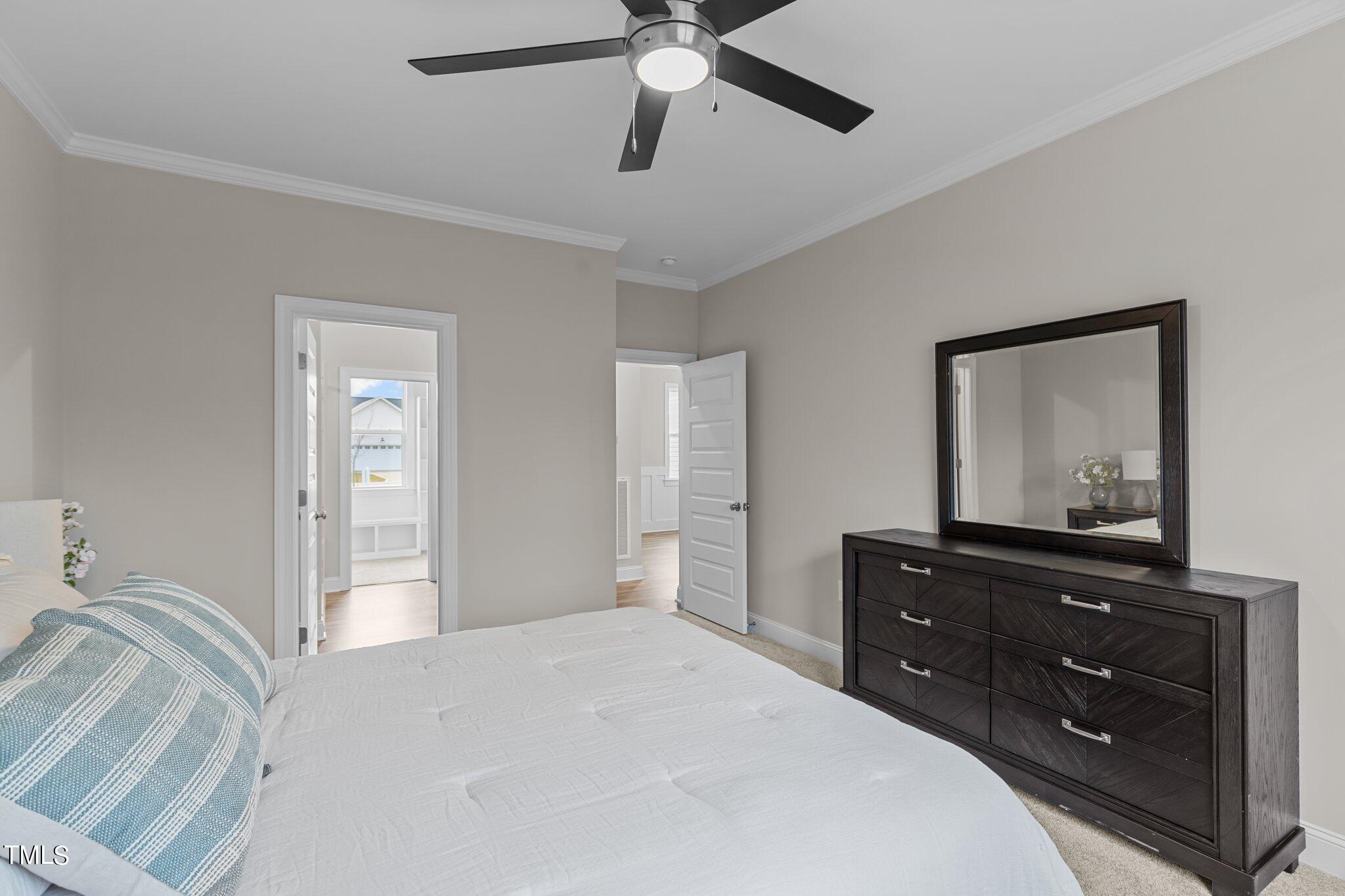 30 Brookhaven Drive Spring Hope, NC 27882 - Photo 9 of 20 a bedroom with a bed and a dresser