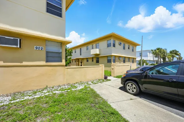a view of a building with a street