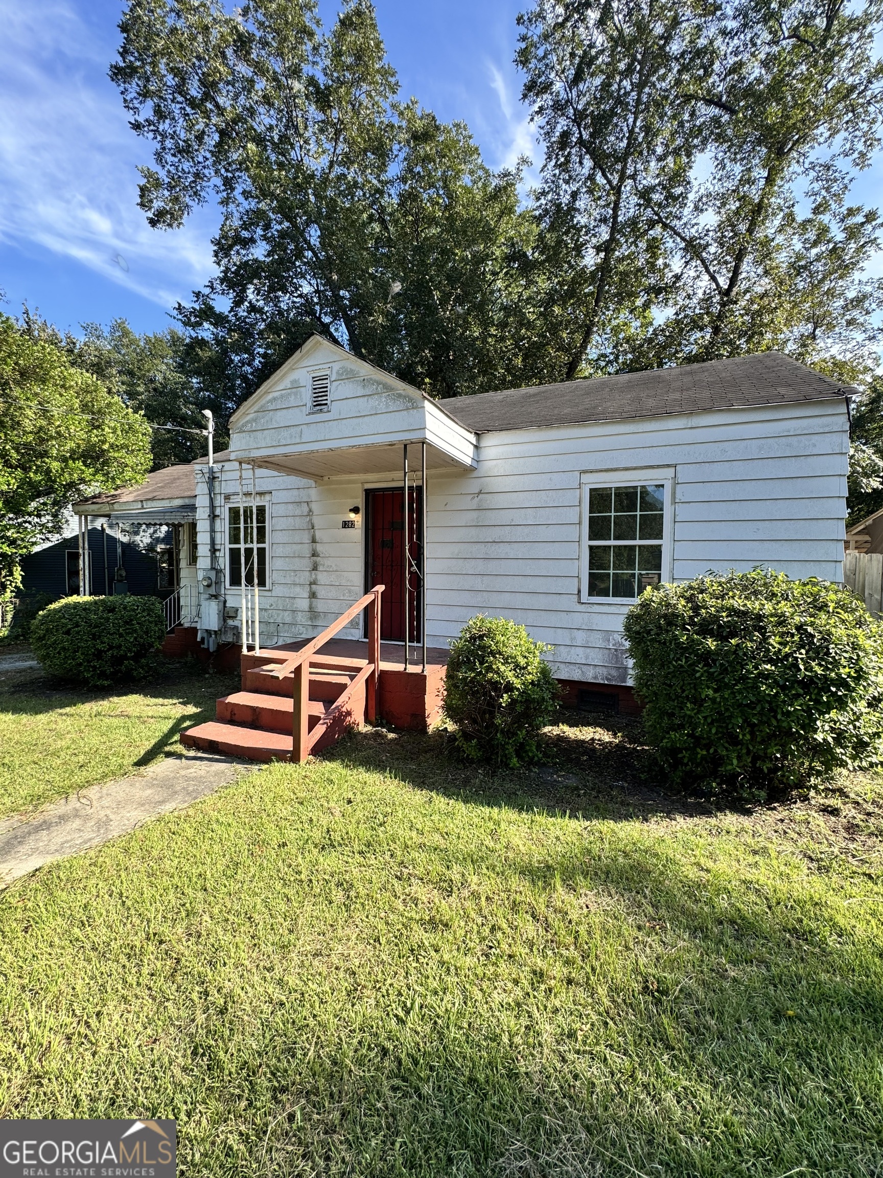 1282 Hartley Street Macon, GA 31206 - Photo 1 of 15 a house view with a outdoor space