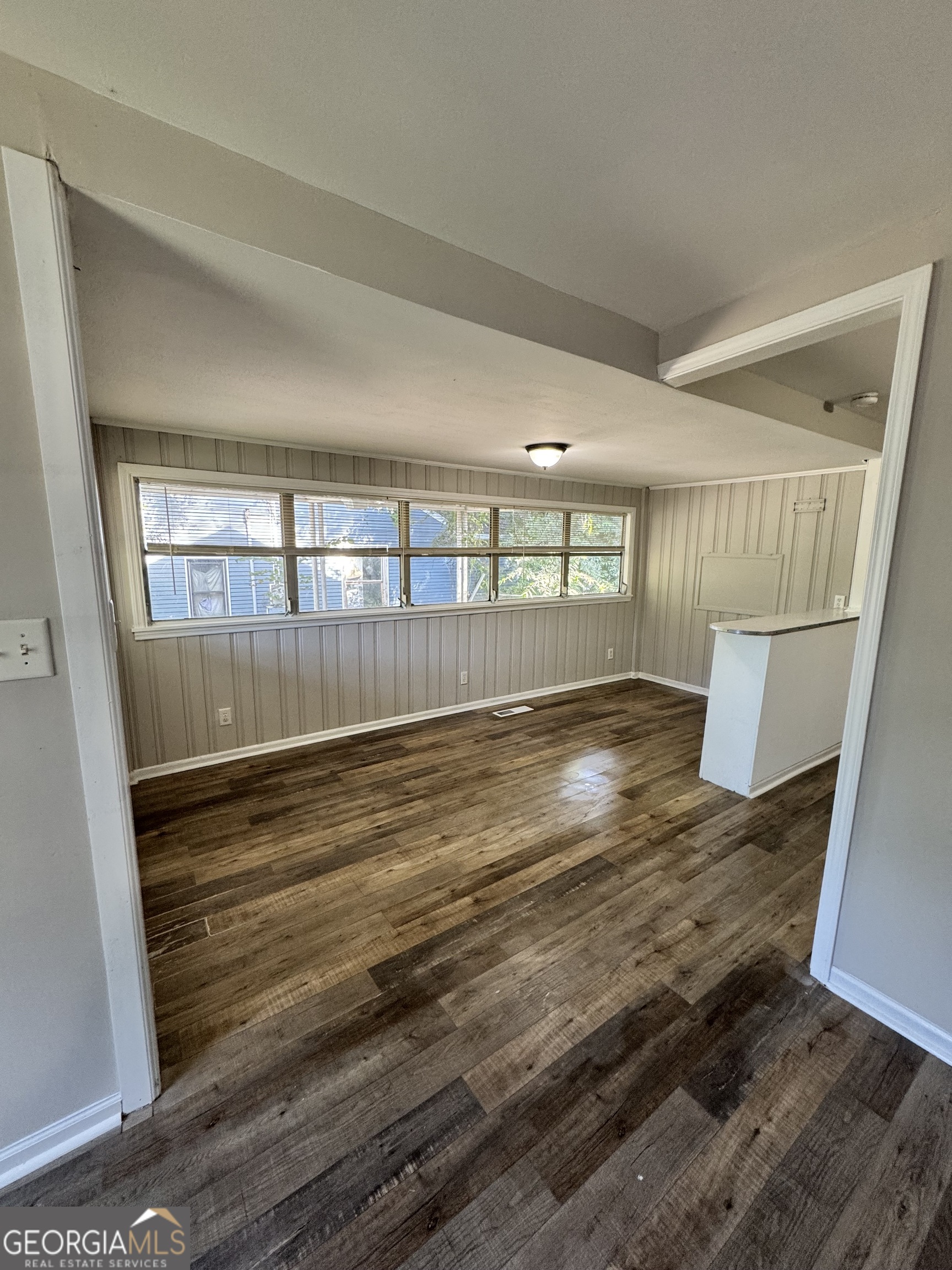 1282 Hartley Street Macon, GA 31206 - Photo 4 of 15 a view of empty room with wooden floor