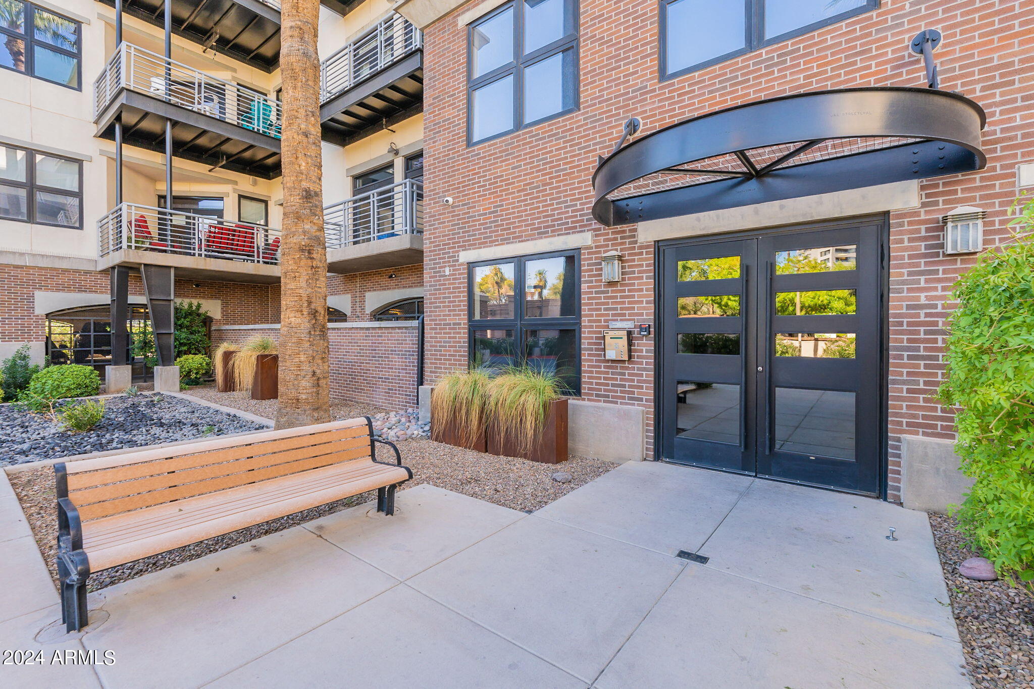 914 East Osborn Road, Unit 416 Phoenix, AZ 85014 - Photo 13 of 44 a view of a building with a outdoor space