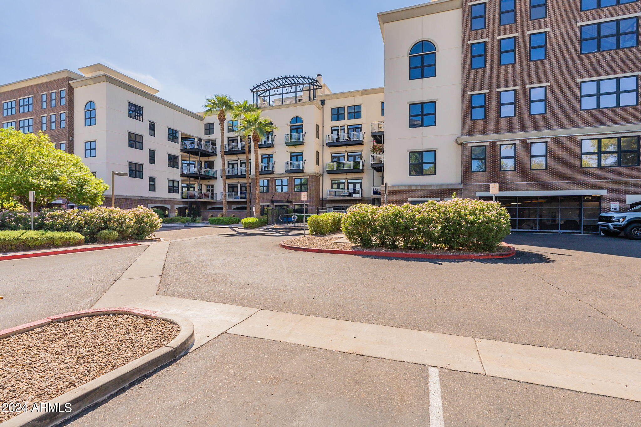 914 East Osborn Road, Unit 416 Phoenix, AZ 85014 - Photo 3 of 44 a front view of a building with street