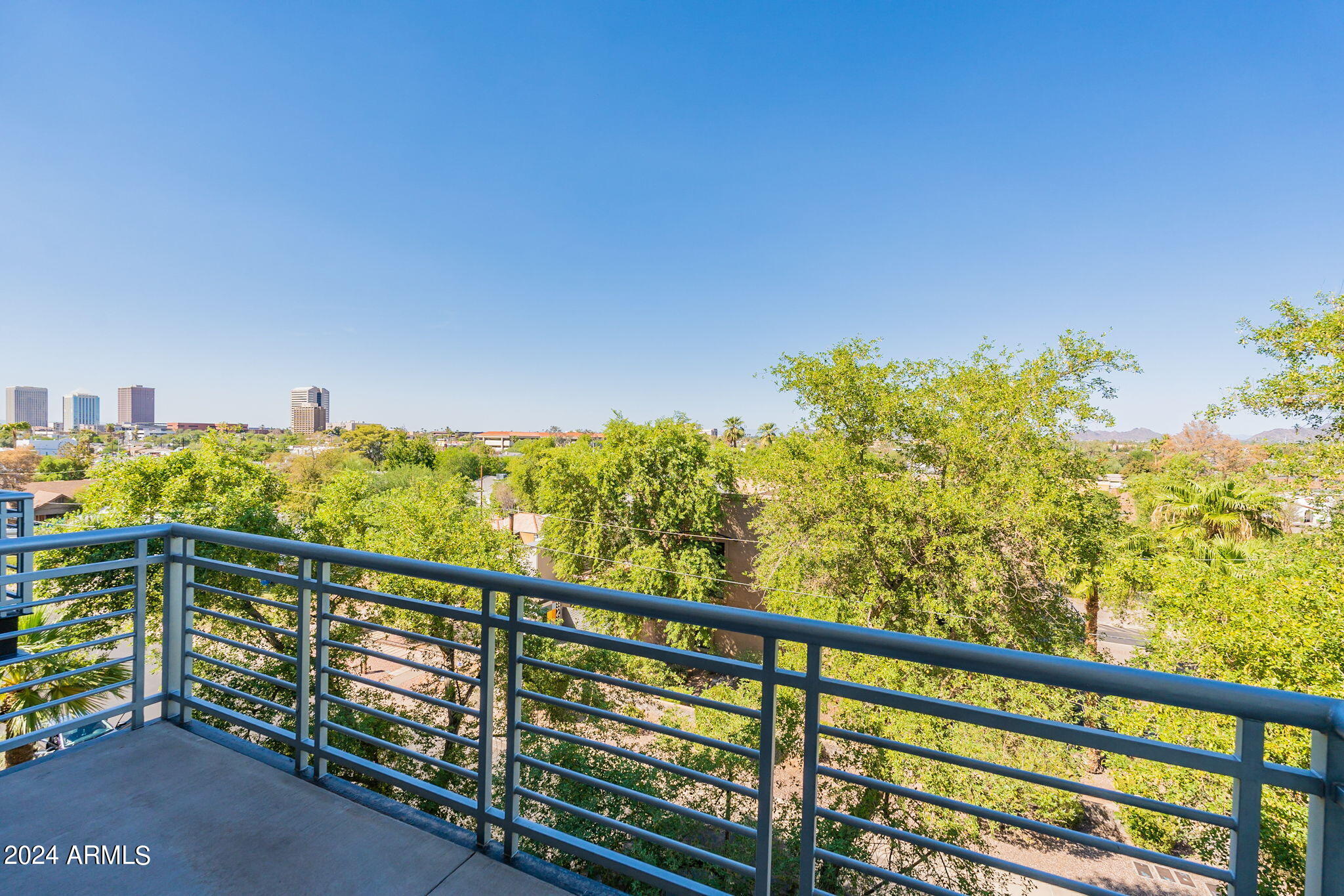 914 East Osborn Road, Unit 416 Phoenix, AZ 85014 - Photo 37 of 44 a view of a balcony with outdoor space
