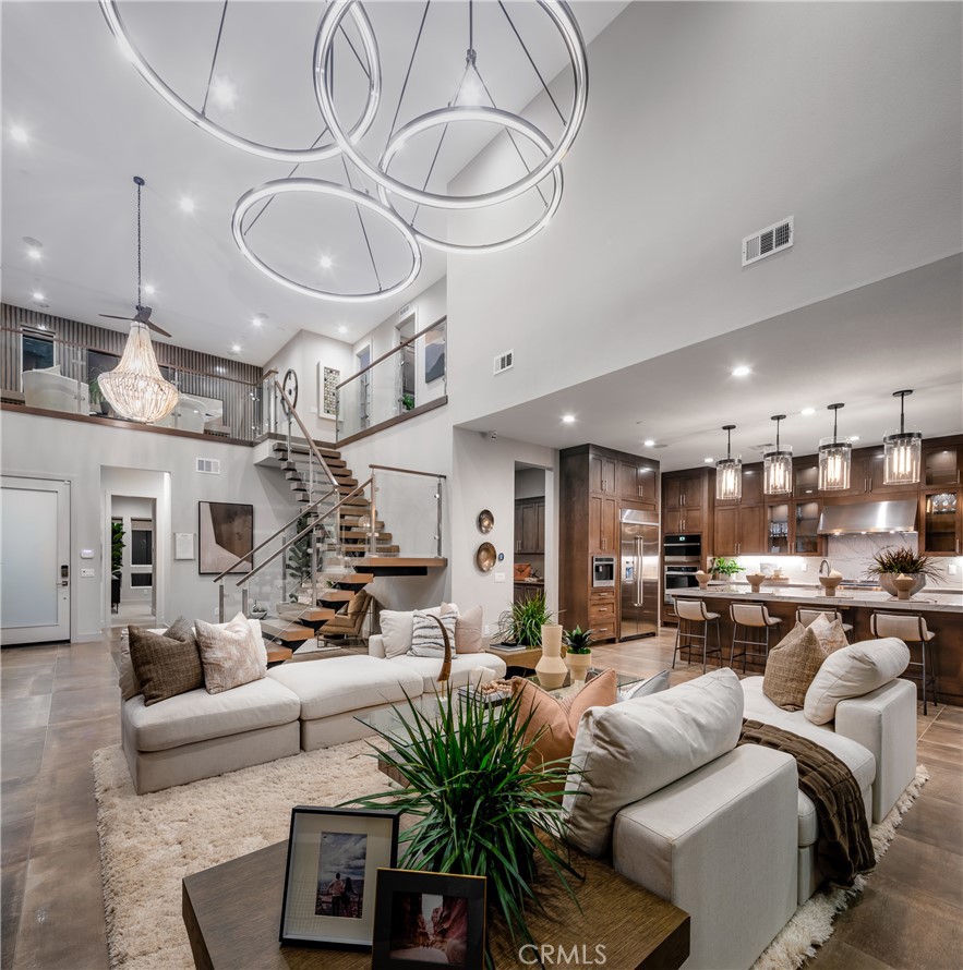 27538 Elderberry Drive Valencia, CA 91381 - Photo 6 of 17 Great Room at Night: Sora type - Skylar II Collection - Photos of Model home. Not actual home for sale.