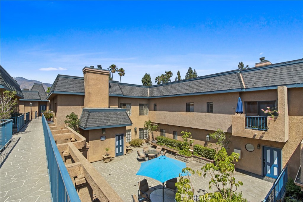 618 Fairview Avenue, Unit 112 Arcadia, CA 91007 - Photo 3 of 3 a view of a terrace with sitting area