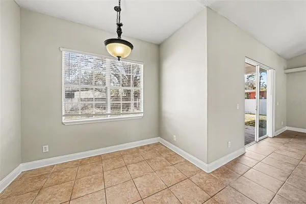 a view of an empty room with window