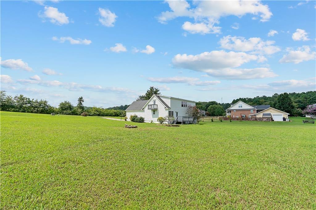 7 Herchel Mize Road Southwest Cave Spring, GA 30124 - Photo 12 of 58 a view of a garden