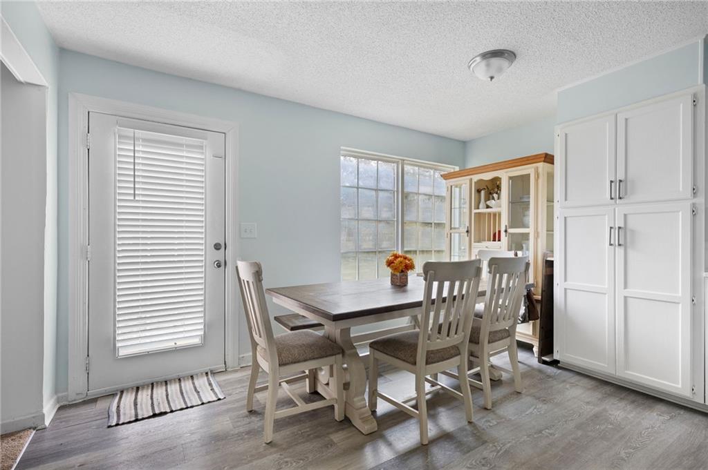 7 Herchel Mize Road Southwest Cave Spring, GA 30124 - Photo 28 of 58 a dining room with furniture and window