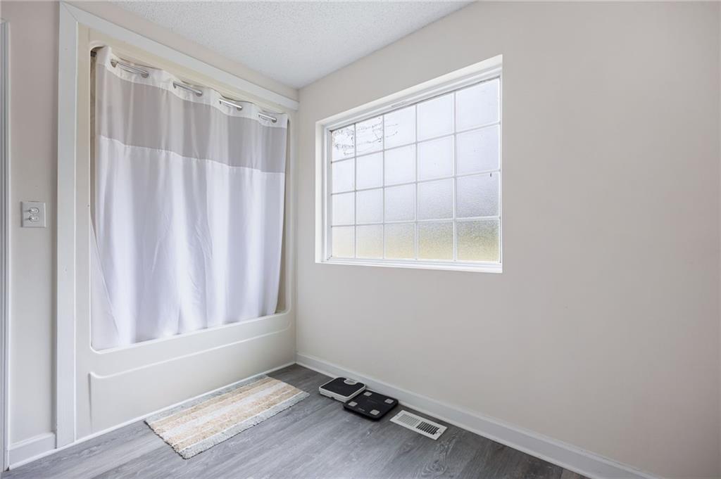 7 Herchel Mize Road Southwest Cave Spring, GA 30124 - Photo 39 of 58 a view of an empty room with a window