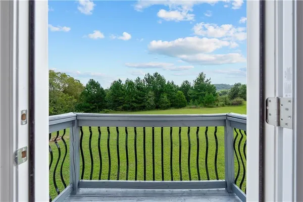 a view of a balcony with outdoor space