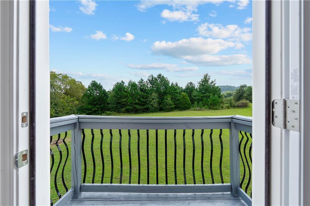 7 Herchel Mize Road Southwest Cave Spring, GA 30124 - Photo 4 of 58 a view of a balcony with outdoor space