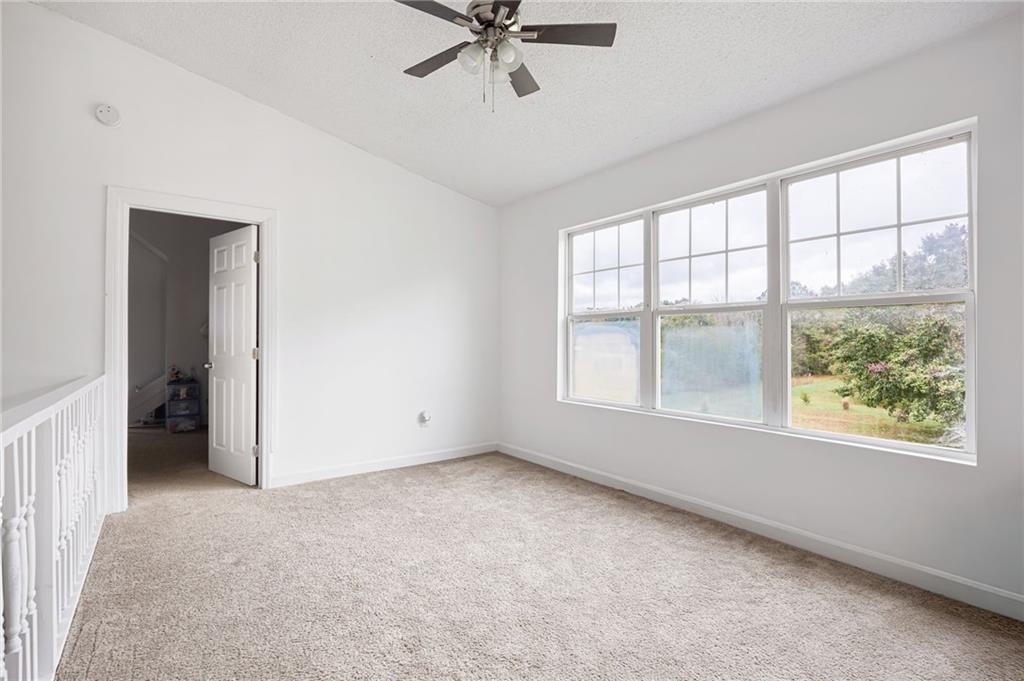 7 Herchel Mize Road Southwest Cave Spring, GA 30124 - Photo 43 of 58 an empty room with windows and closet