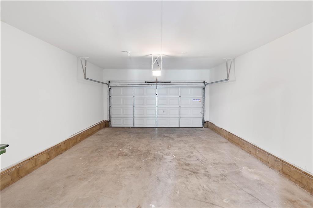 7 Herchel Mize Road Southwest Cave Spring, GA 30124 - Photo 5 of 58 an empty room with chandelier fan