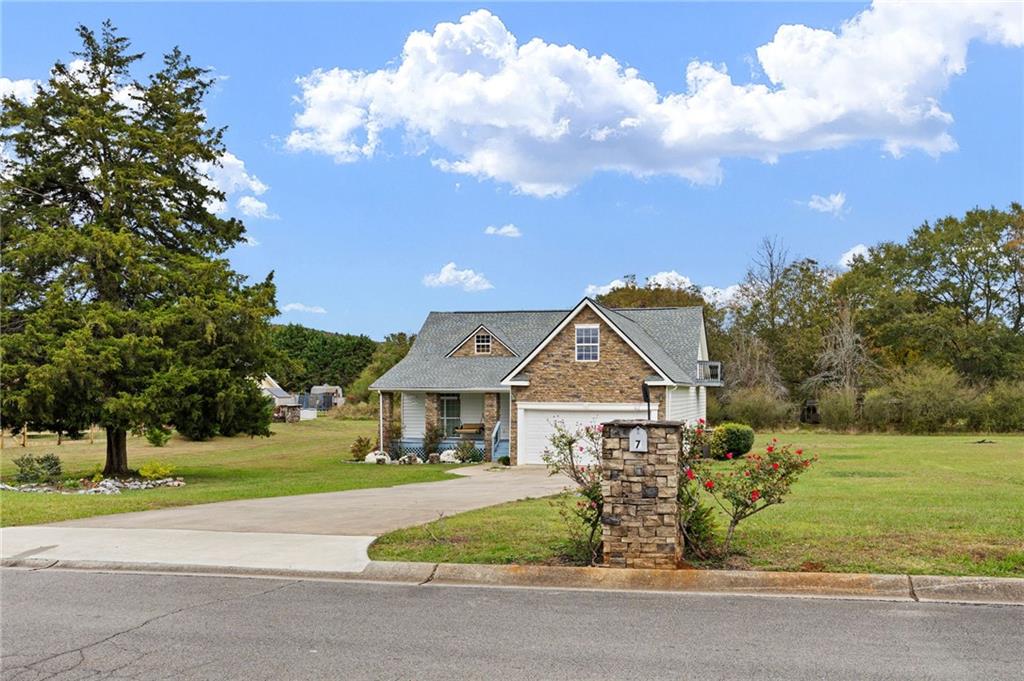7 Herchel Mize Road Southwest Cave Spring, GA 30124 - Photo 57 of 58 a front view of a house with a yard
